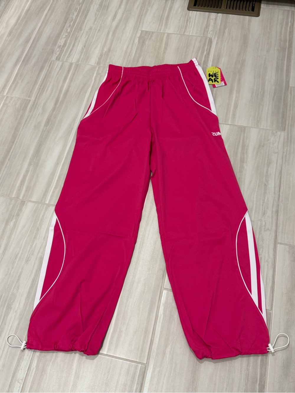 NWT Zumba Wear Pink Worldwide Curvy Track Pants - Picture 2 of 3